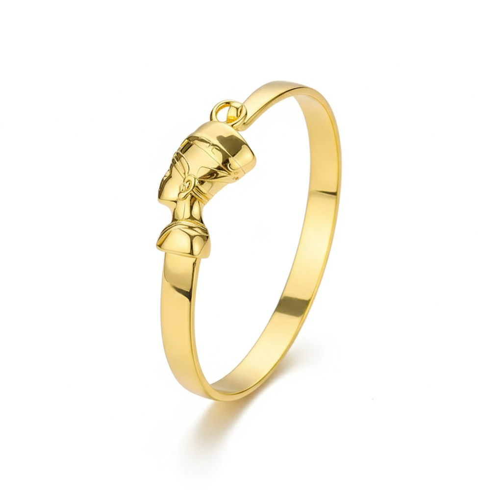 Gold bracelet with a unique design on a white background