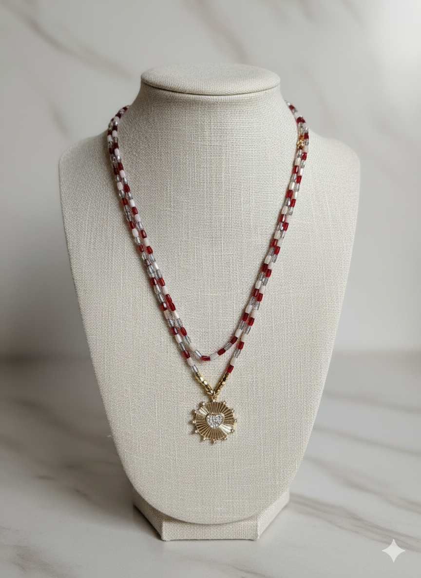 Necklace with a sunflower pendant on a mannequin bust against a neutral background