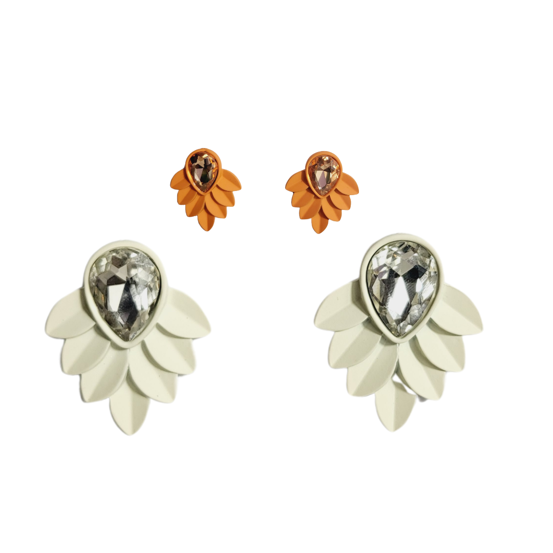 A pair of leaf-shaped earrings with a central diamond and smaller clear crystals, in a gold-tone finish.